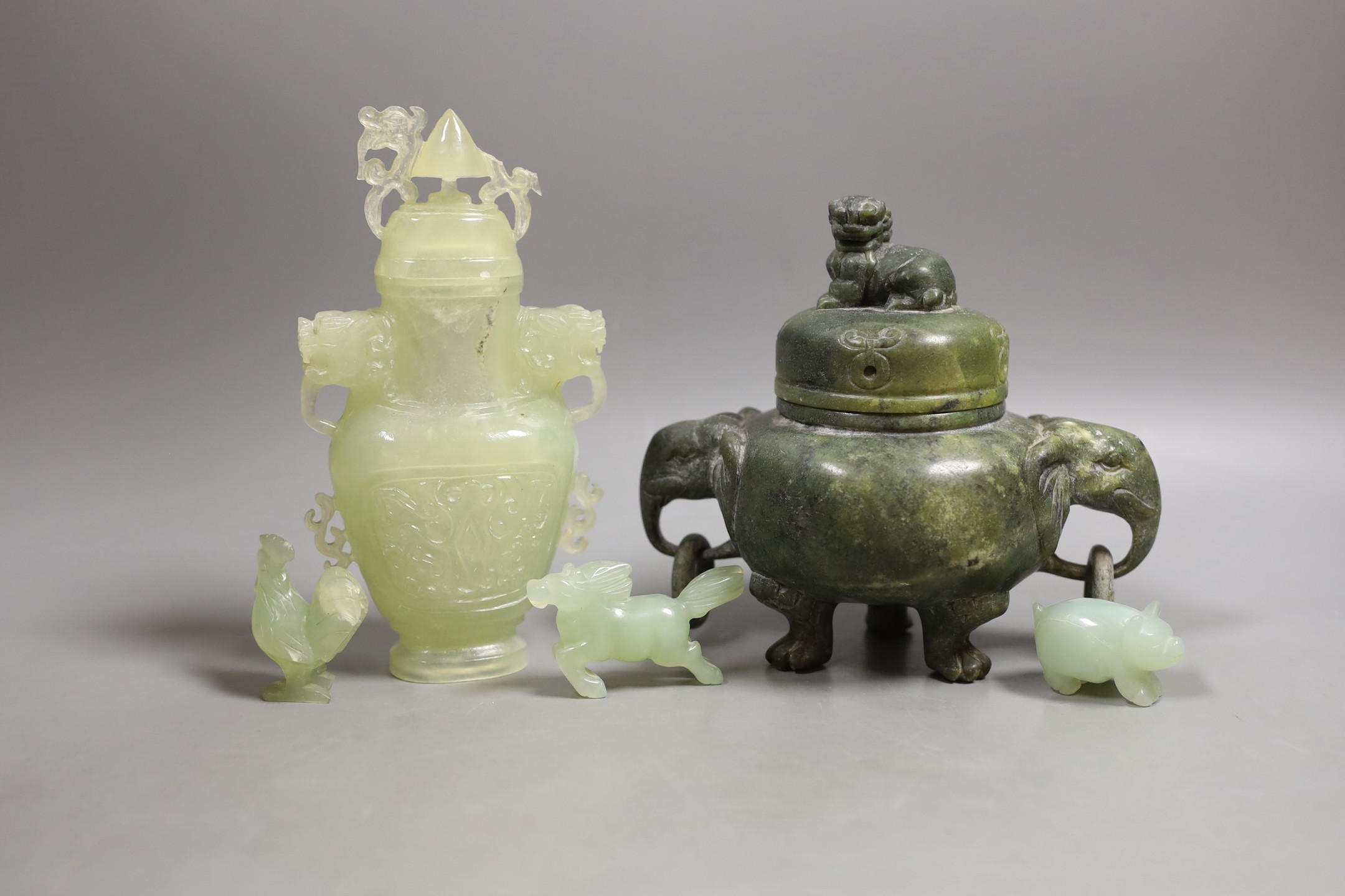 A Chinese green soapstone tripod censer and cover and a group of Chinese bowenite jade carvings- censer 14 cms high.